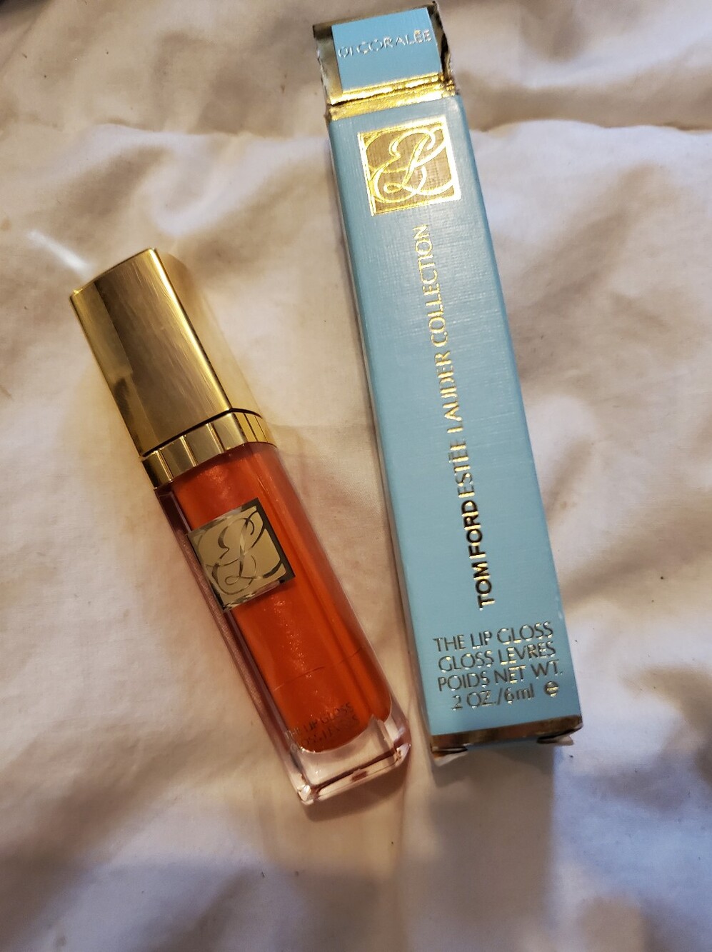 Discontinued Estee Lauder Lip Gloss in Red Orange with Gold Cap